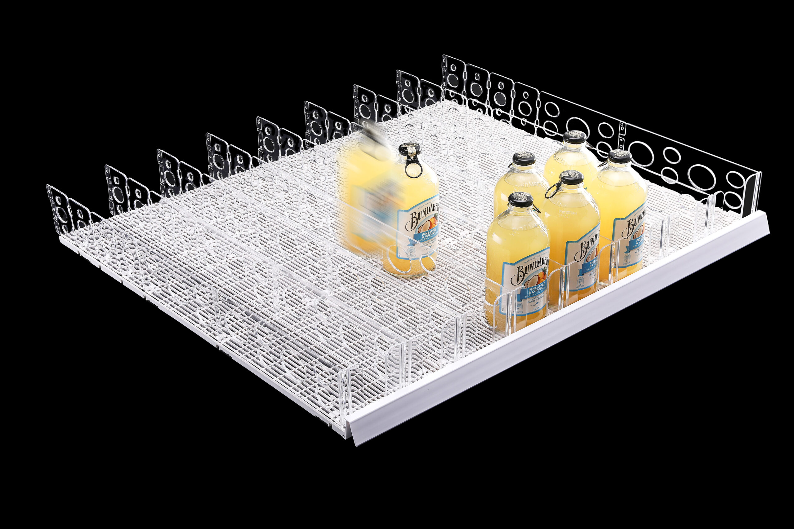 Gravity feed sliding mat with dividers